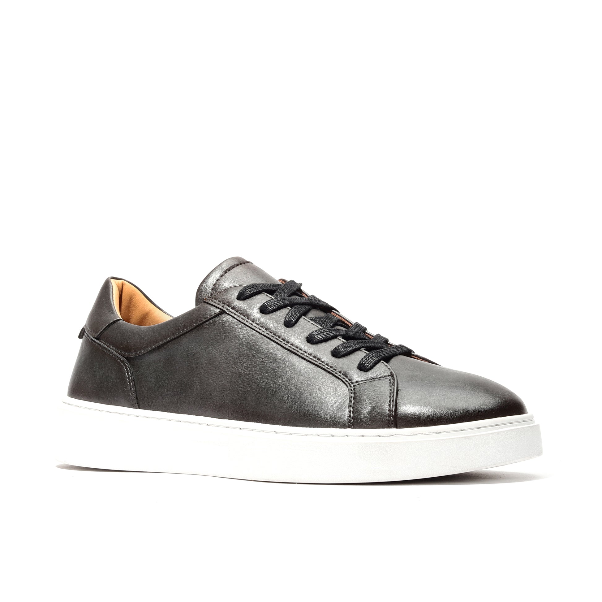 Side profile of black genuine leather sneakers men featuring cushioned insole and sleek finish.