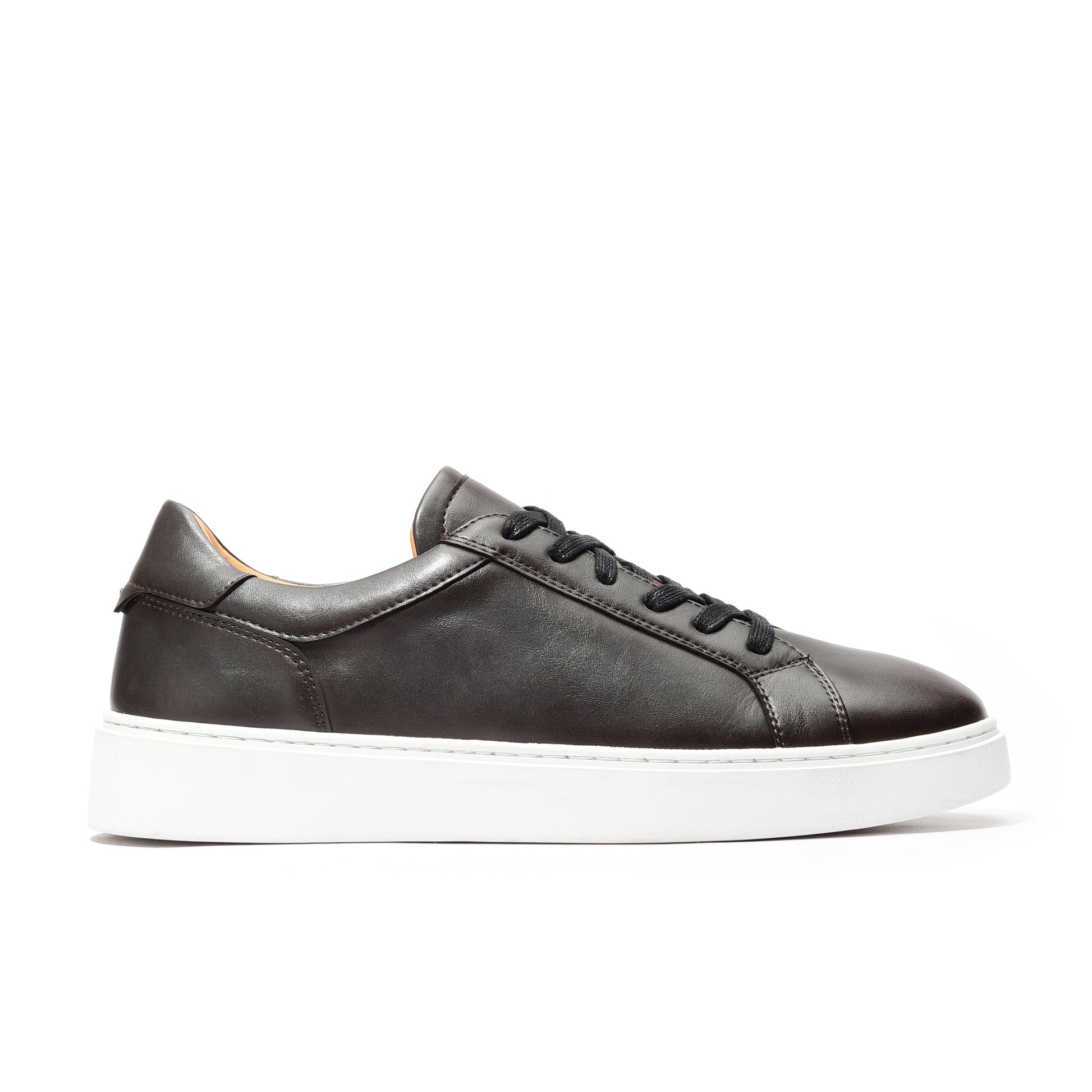 Top view of black casual leather sneakers for men with breathable lining and padded collar.
