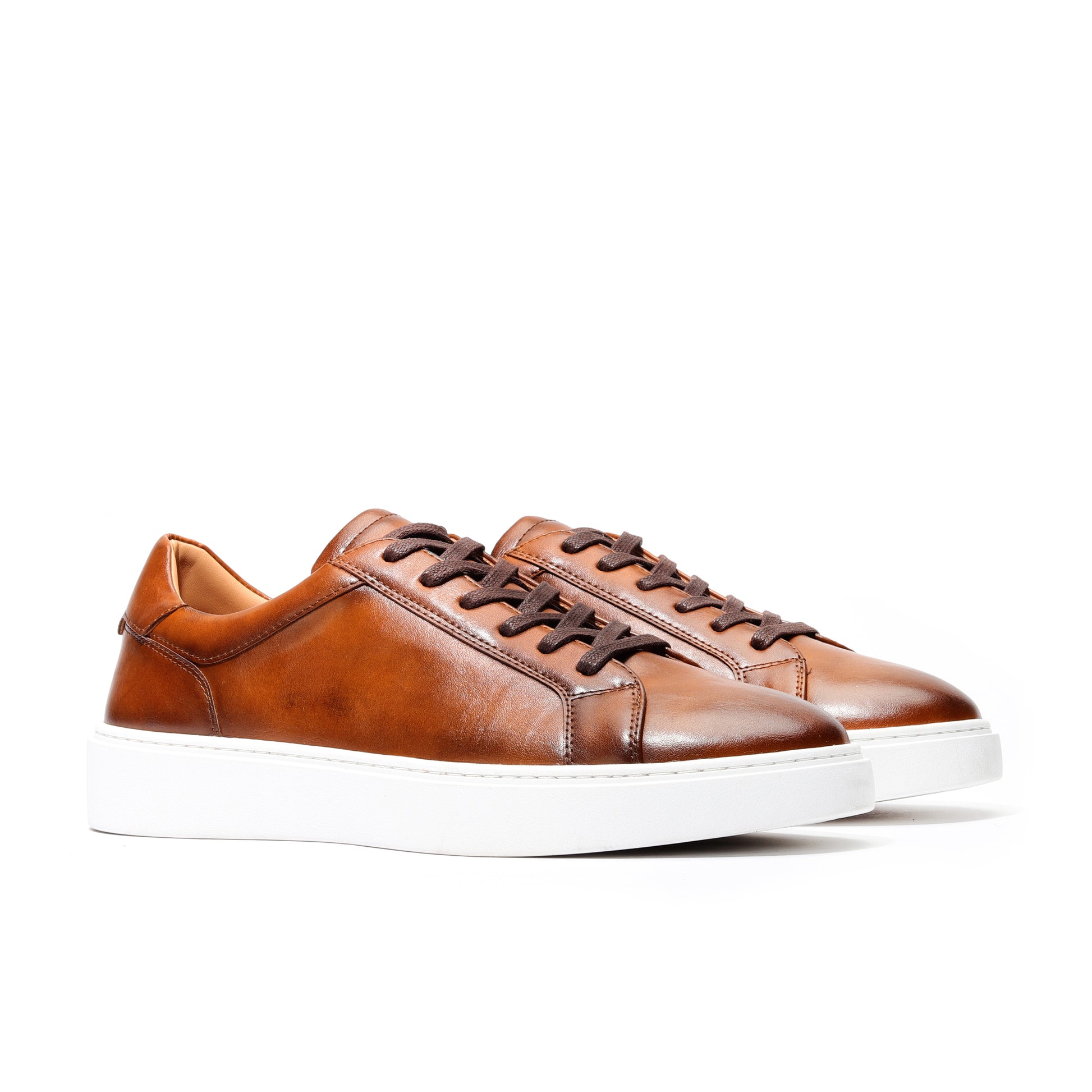 Top view of brown genuine leather sneakers men with memory foam cushioned insole.