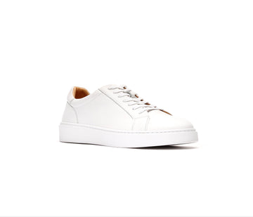 Angled view of white premium leather sneakers for men with full-grain upper and stitched rubber sole.