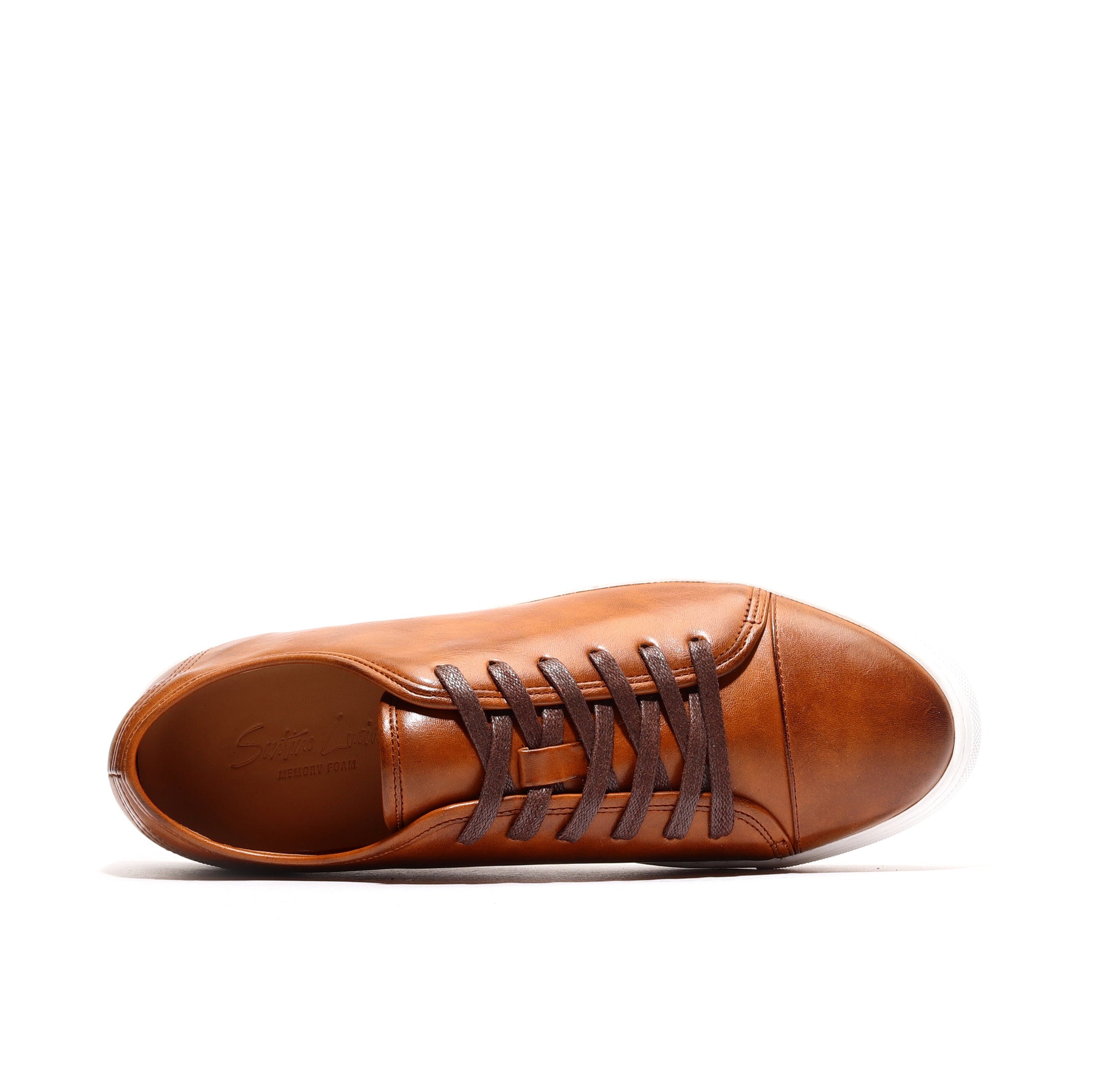 Top view of cognac luxury leather sneakers for men showcasing sleek stitching and cushioned insole.