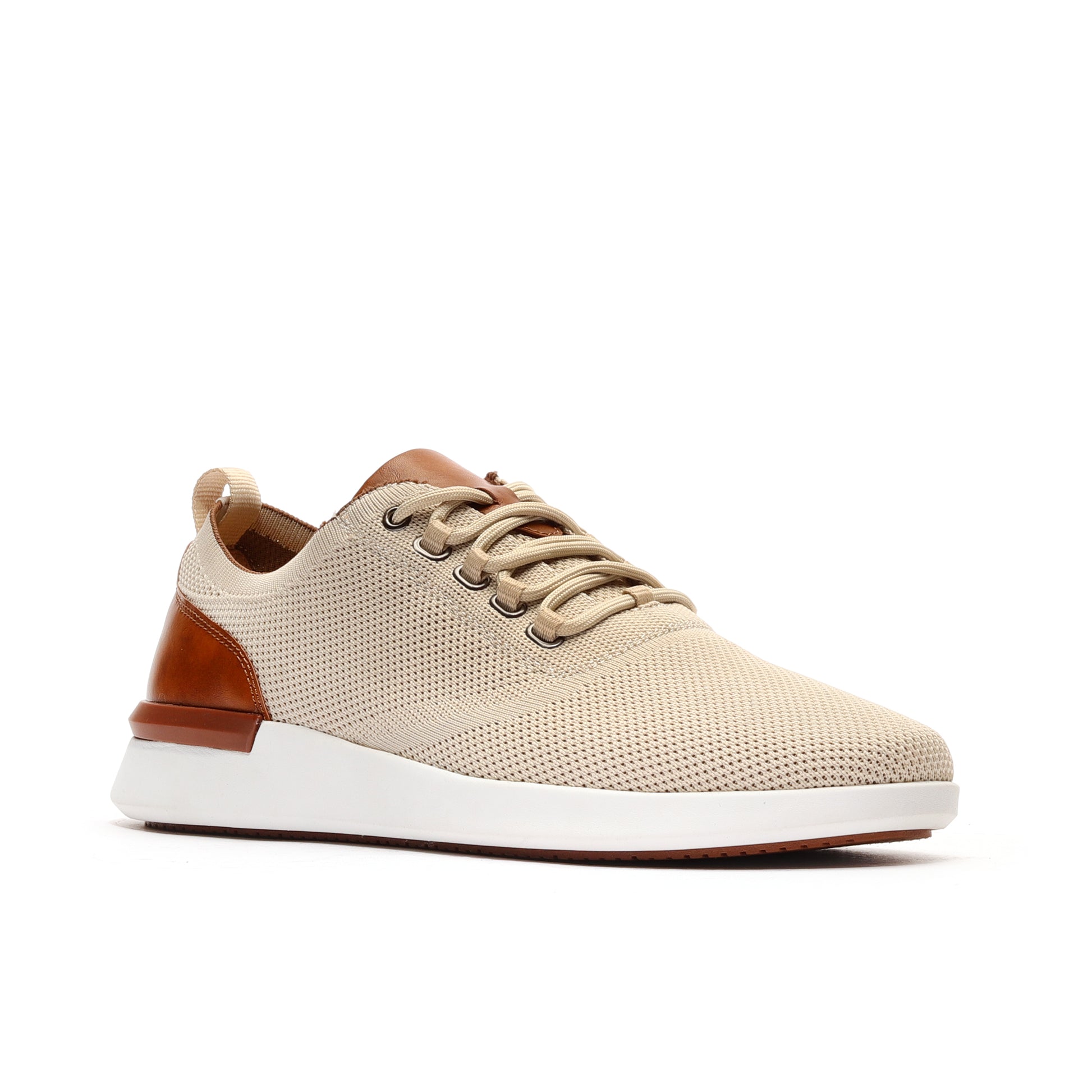 Angled profile of sand-colored men's athleisure sneakers, featuring a modern design with versatile comfort and style for casual wear.