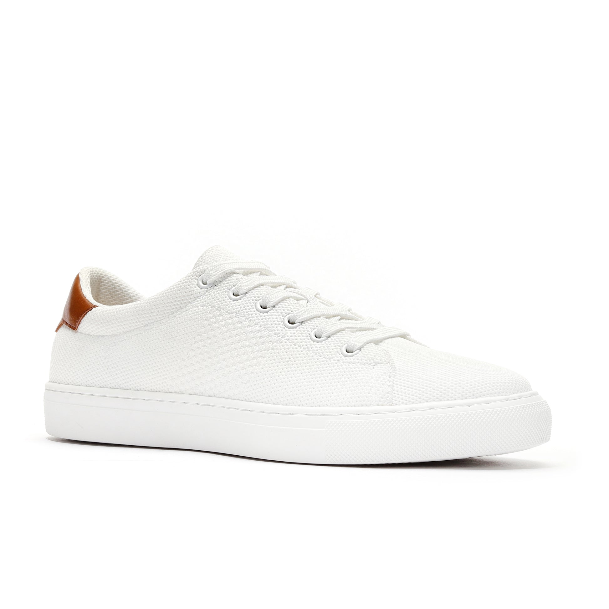 White sport knit sneaker angled view showing the breathable mesh upper, flexible sole, and sleek modern design. Perfect for workouts, running, or casual wear, providing a comfortable, lightweight, and stylish option for active lifestyles.